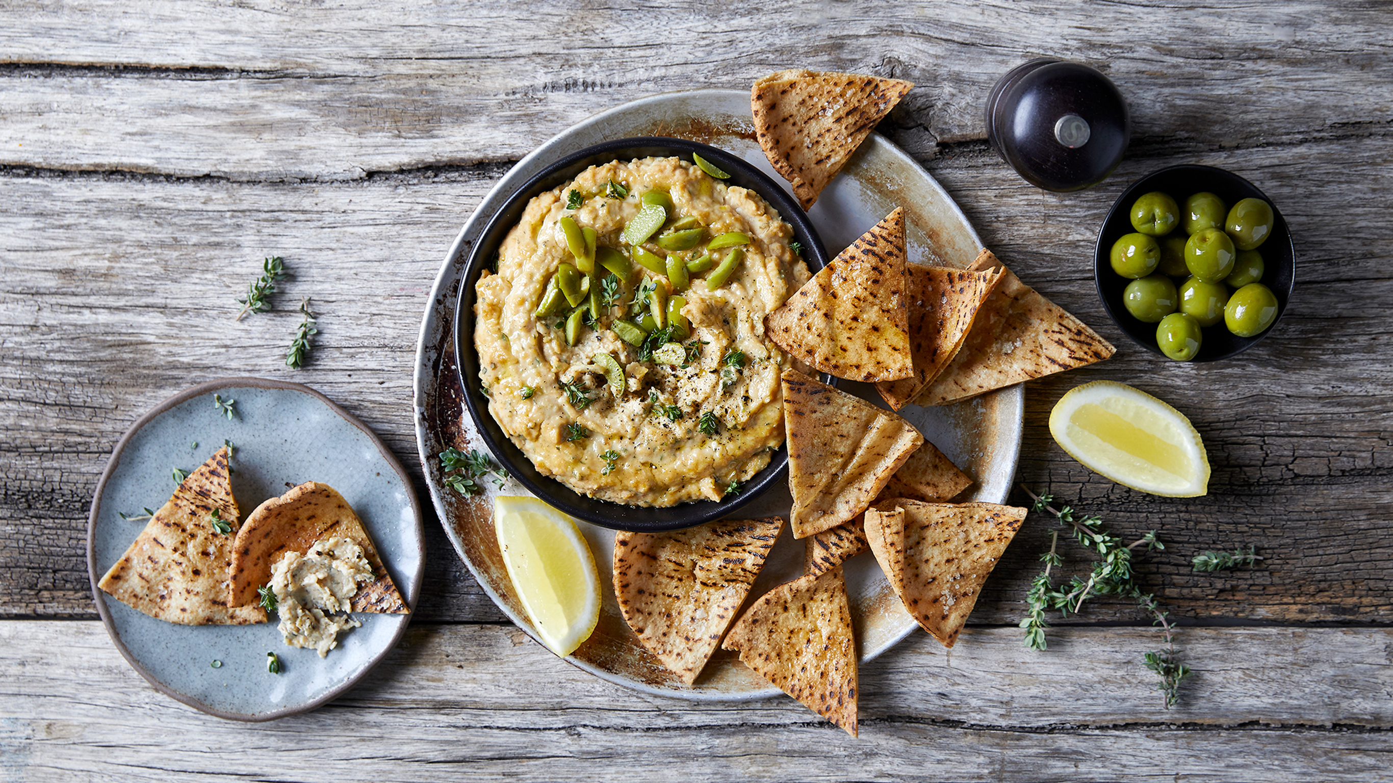 Lemon & Thyme Baked Hummus with Olives & Pita