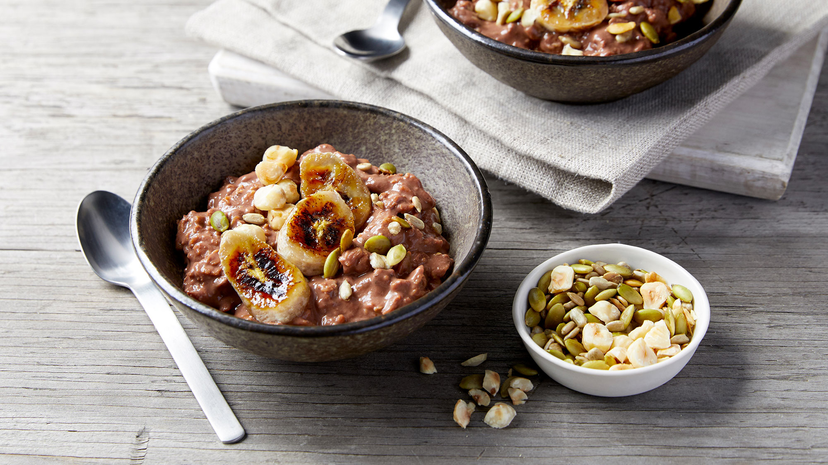Chocolate Nut & Seed Protein Oats with Caramelized Banana