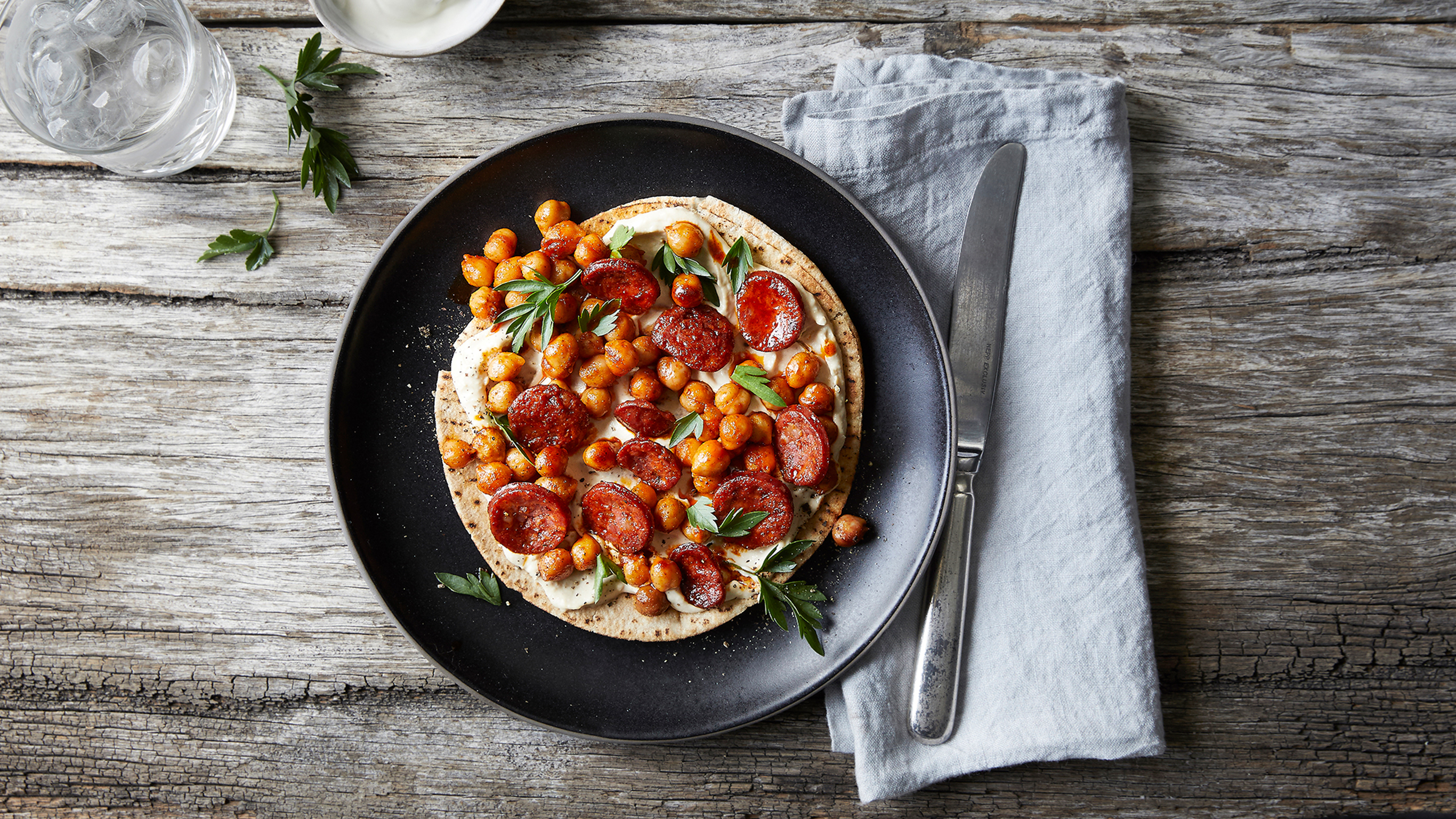 Centr's Smoky Chickpea & Chorizo Flatbread is full of the nutrients your body craves when digesting alcohol.