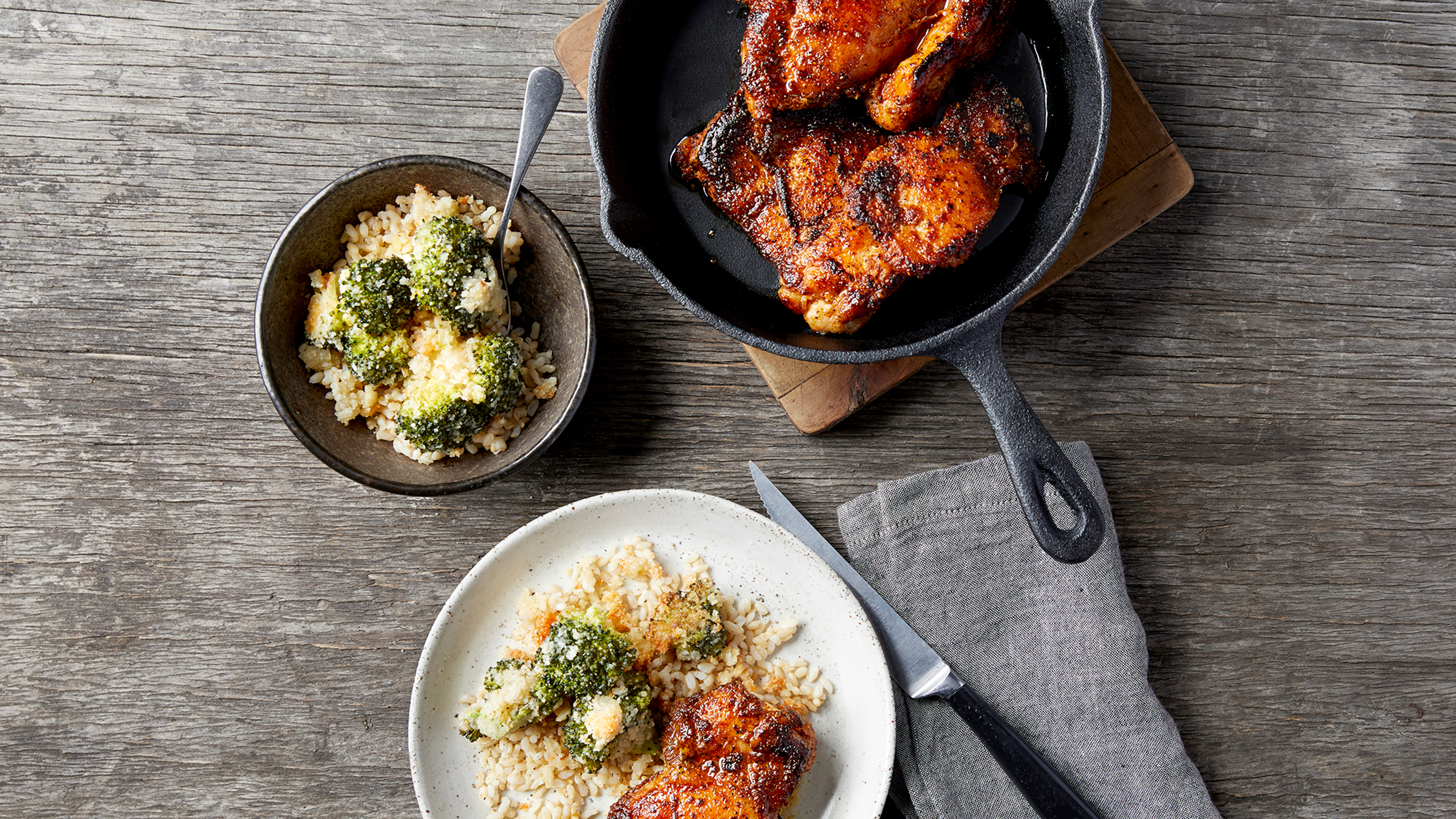 Blackened chicken with broccoli and rice.