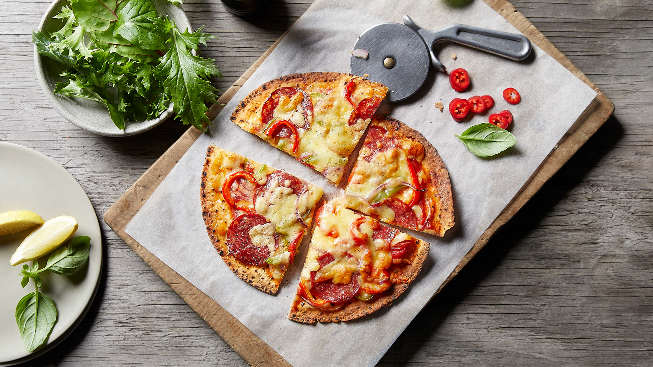 A pepperoni pizza made on flat bread.