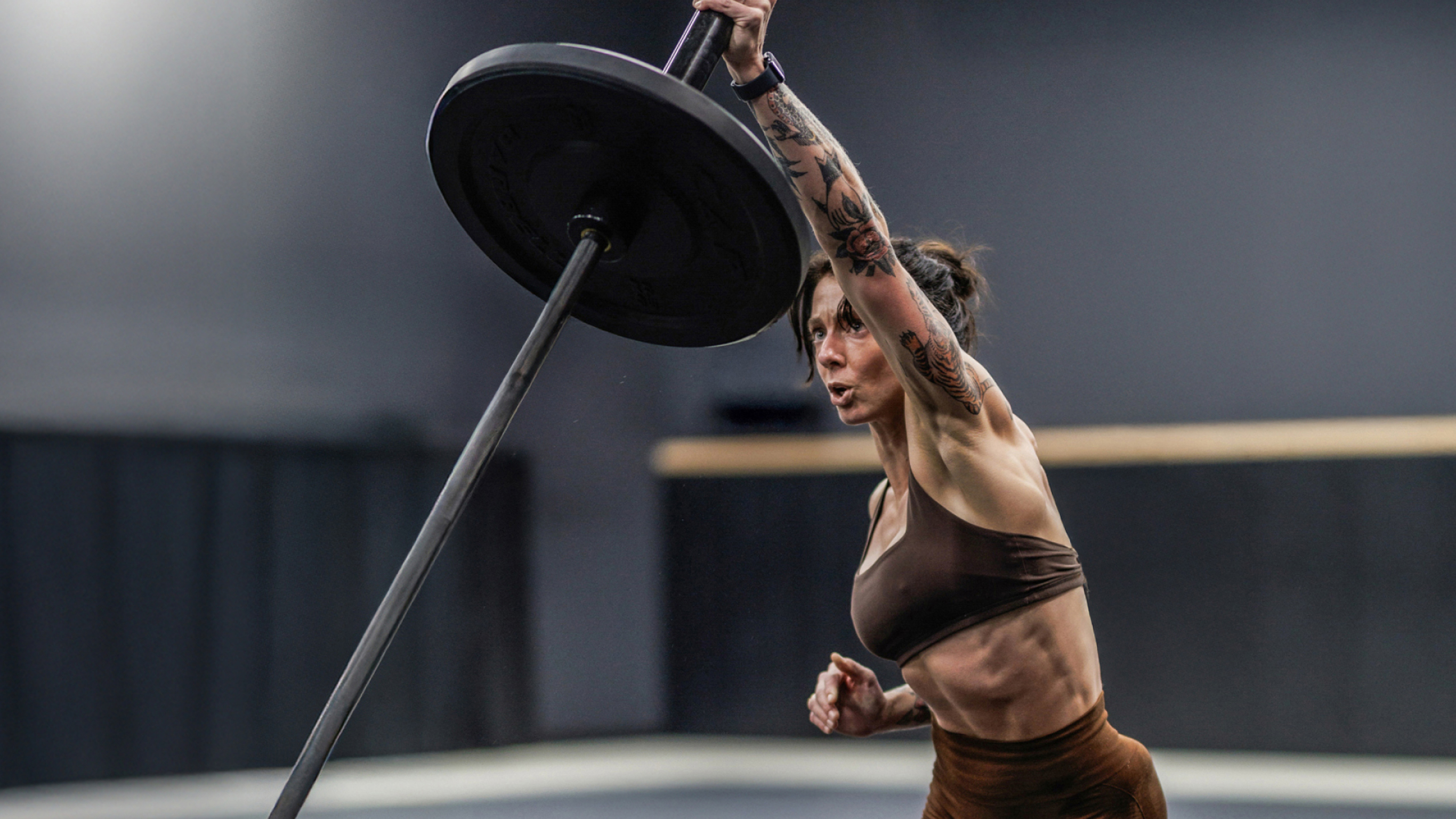 Steph Rose performs a landmine thrust.