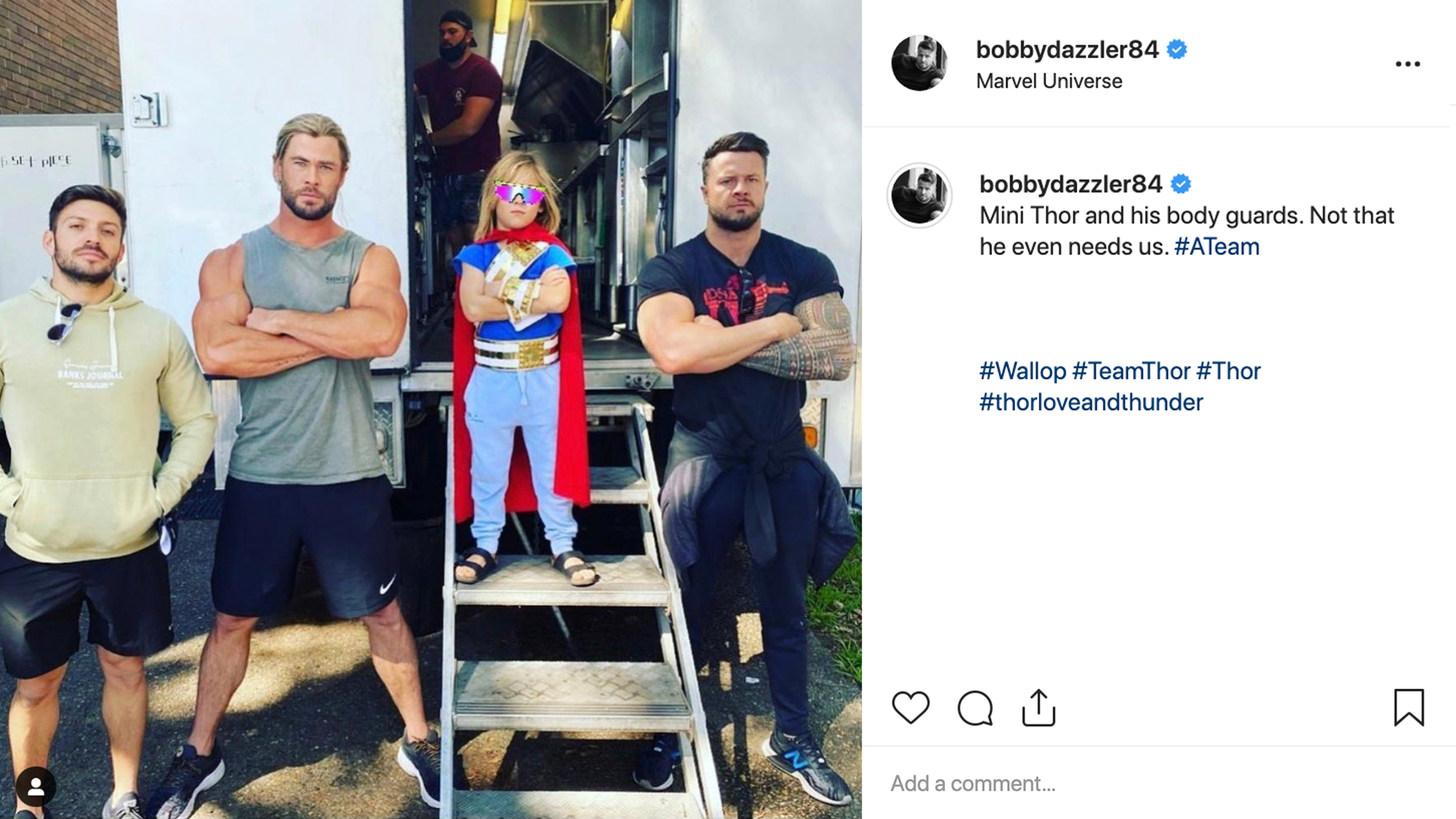 An Instagram post of Chris Hemsworth standing with his son and two men outside of a trailer.