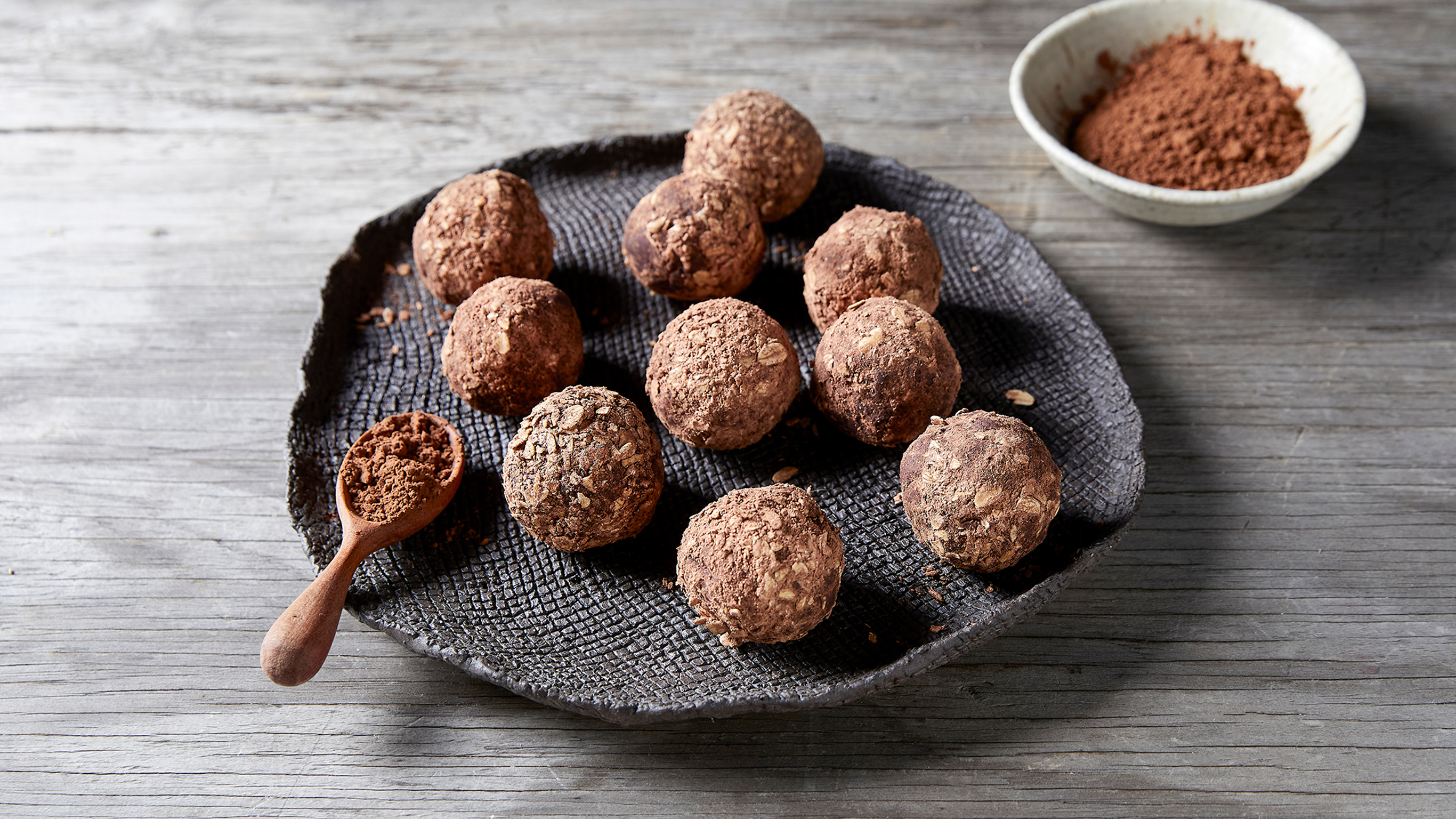 A bowl of several Choc-Mint Energy Bites.