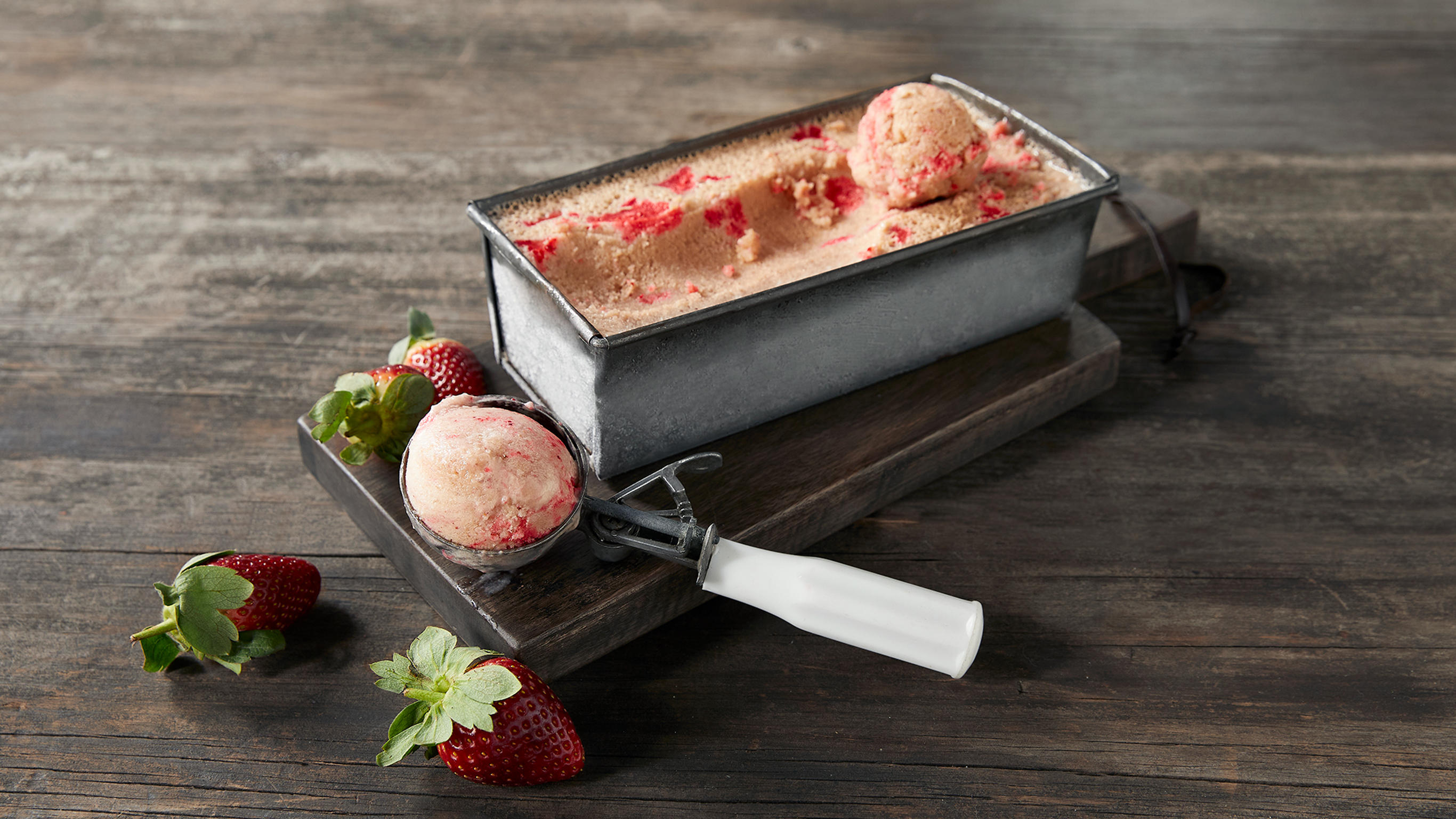 A scoop of homemade Strawberry protein ice Cream.