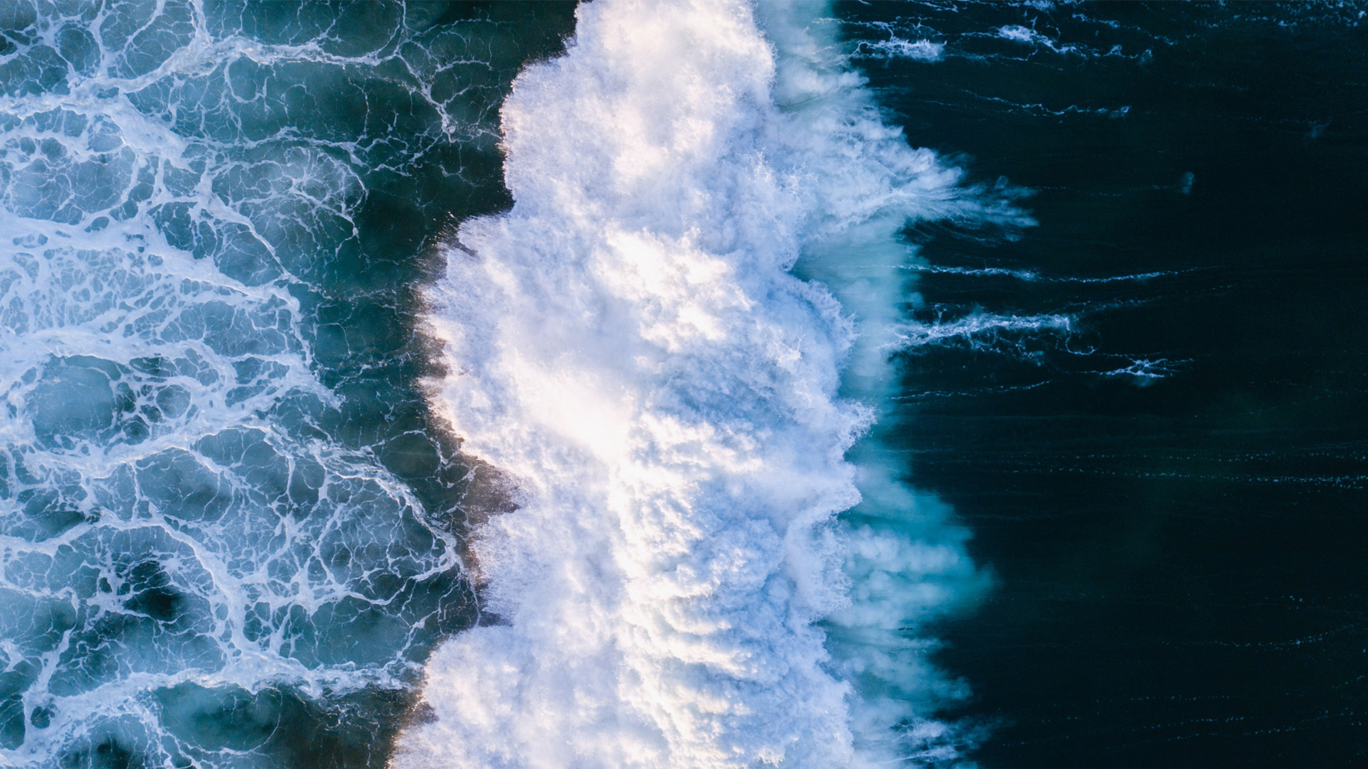 A powerful ocean wave as seen from above.