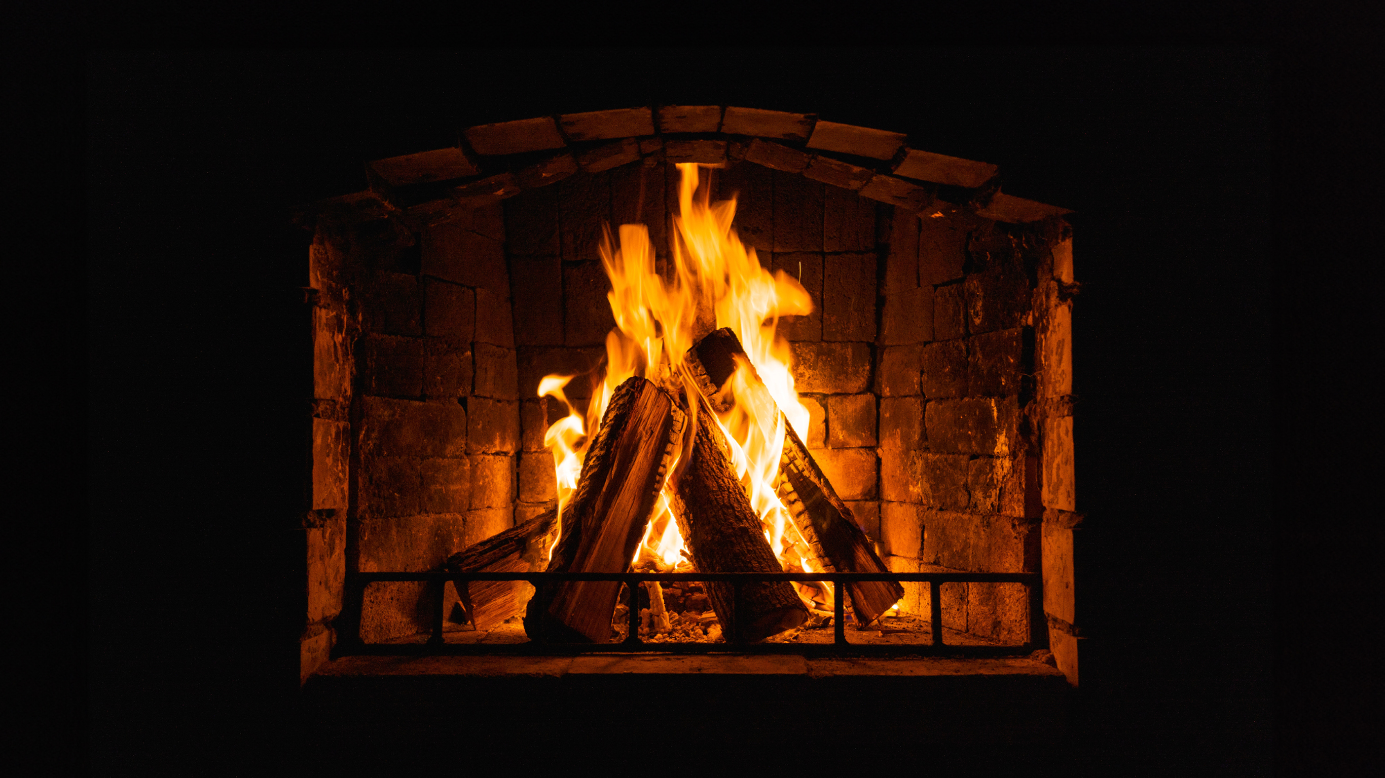 A crackling log fireplace.