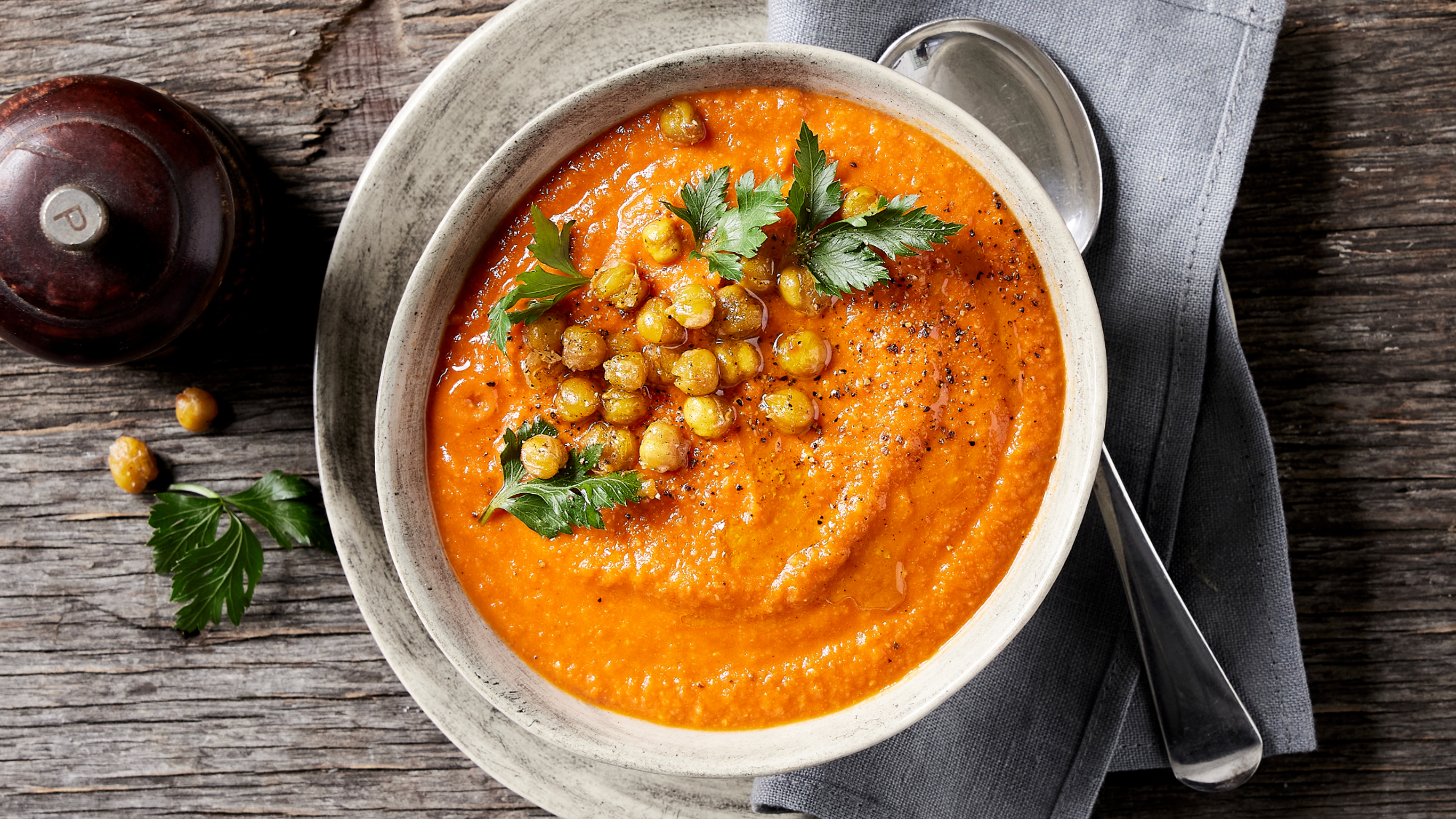A serving of Spicy Red Pepper Soup with Crispy Chickpeas from the Centr meal plan.