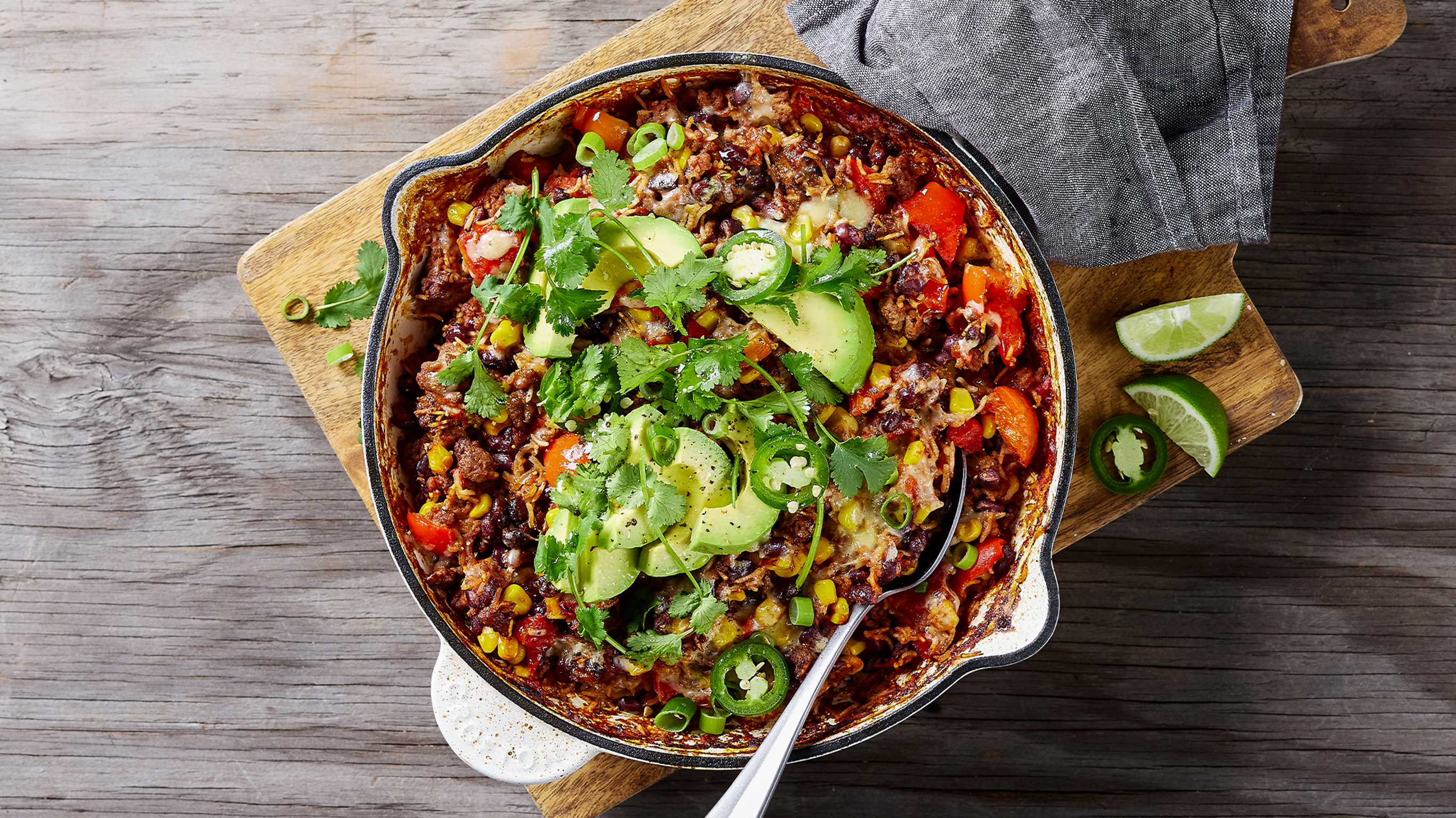 A pot of One-pot Taco Beef & Rice Bake, from the Centr meal library, sits on a table.