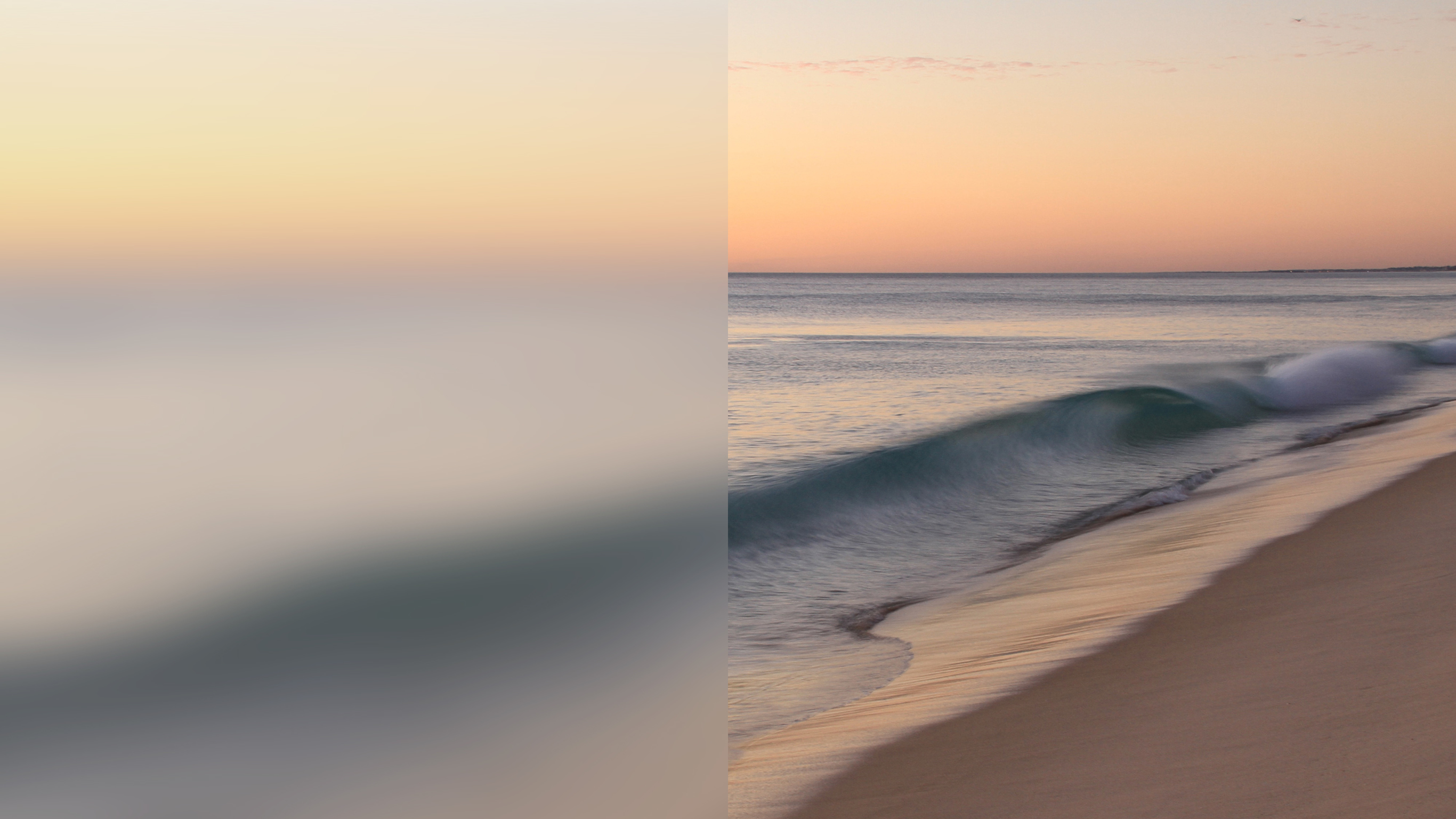 An image of the ocean and a beach at dawn.