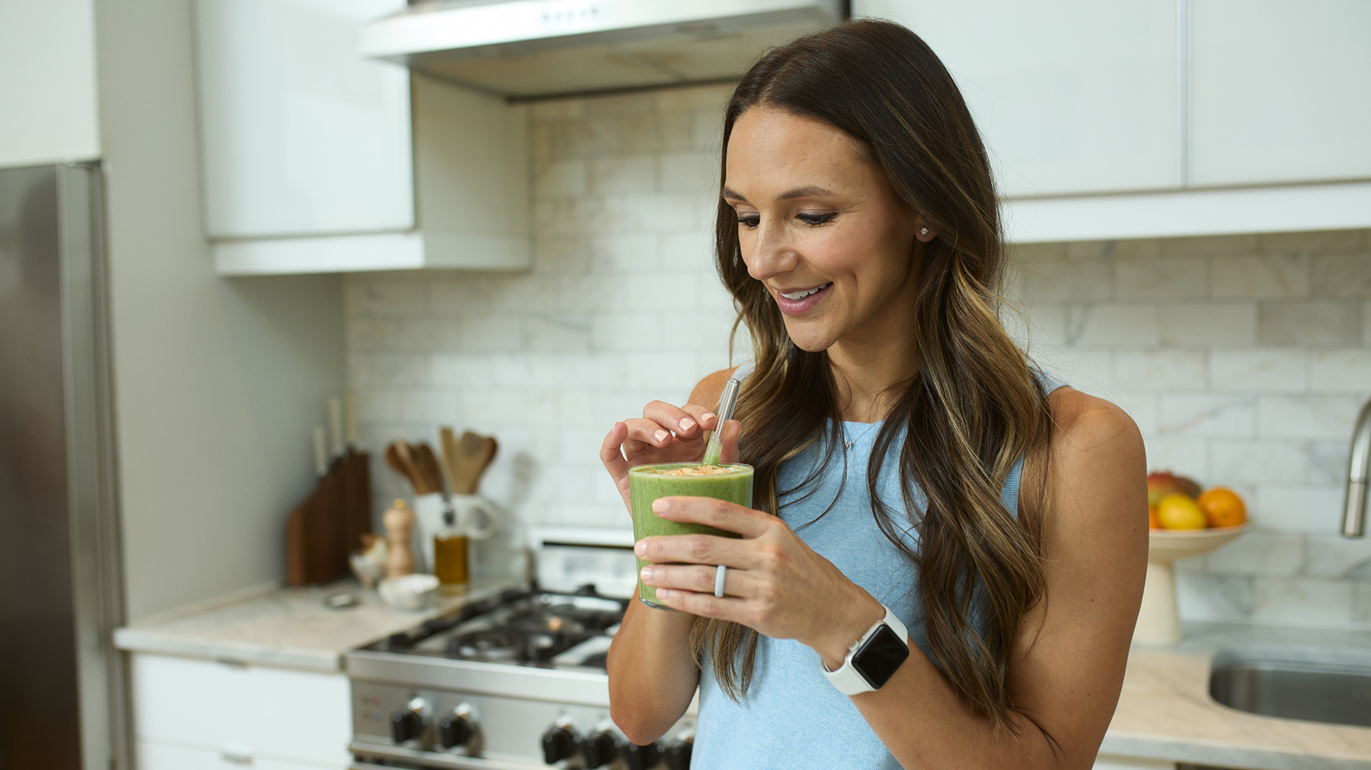 Centr dietitian Angie Asche sips a green reset smoothie.