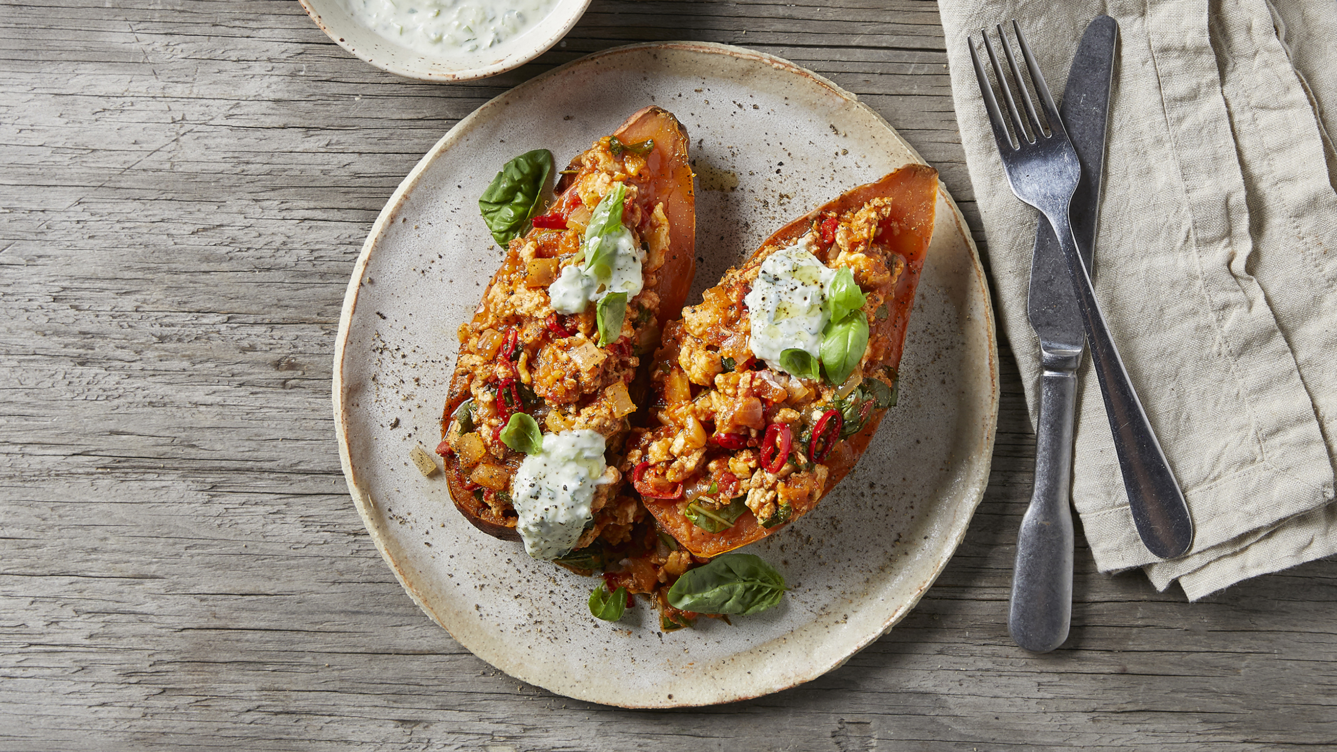 A plate of Centr's turkey-loaded sweet potatoes is ready for eating