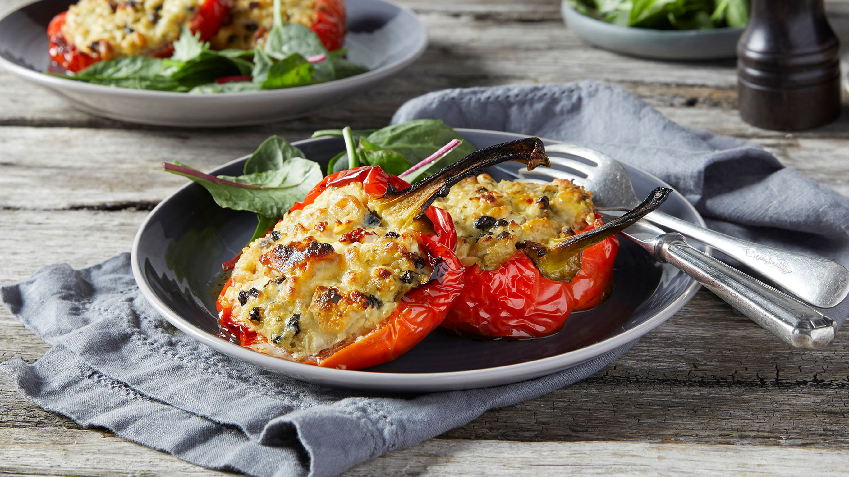 A bowl of Centr's Moroccan-style Stuffed Peppers is ready for eating.