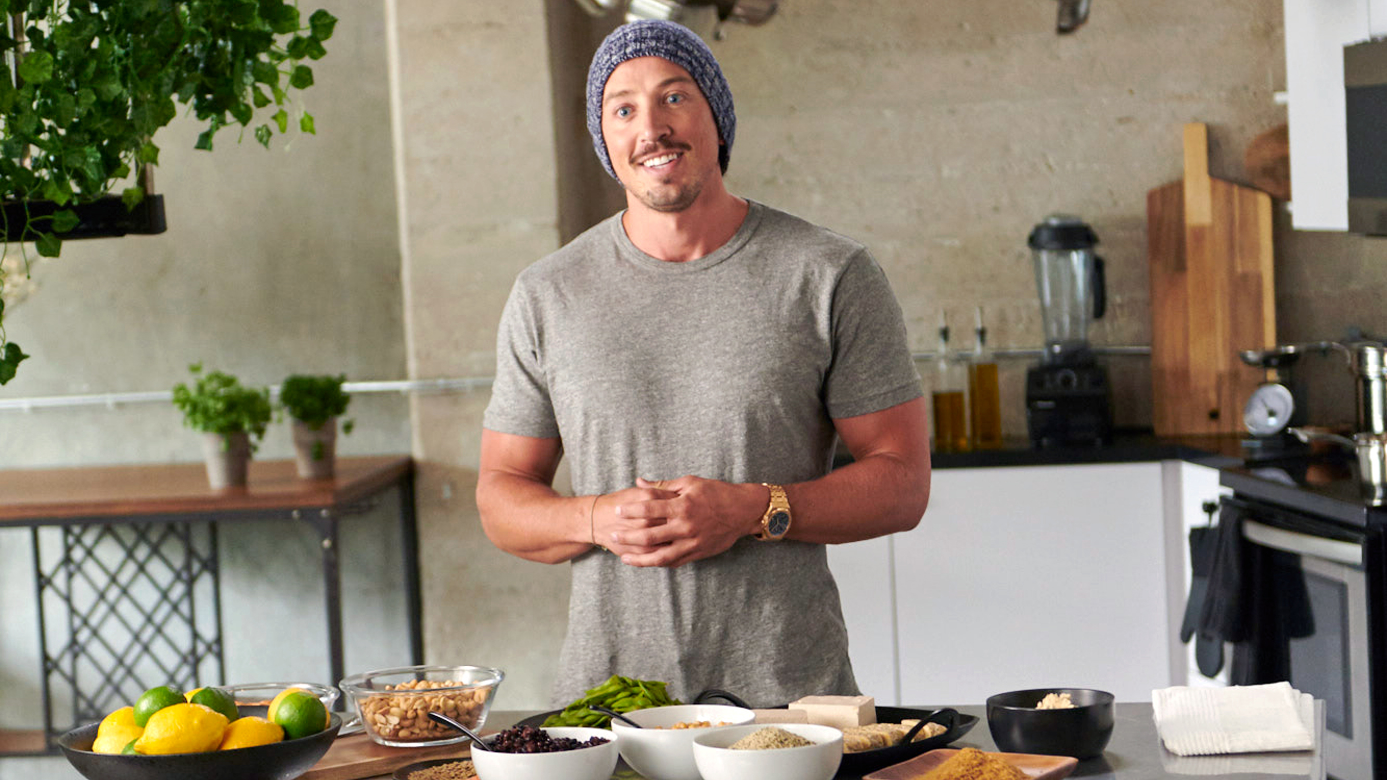 Chef Simon Hill in the kitchen wearing a beanie hat.