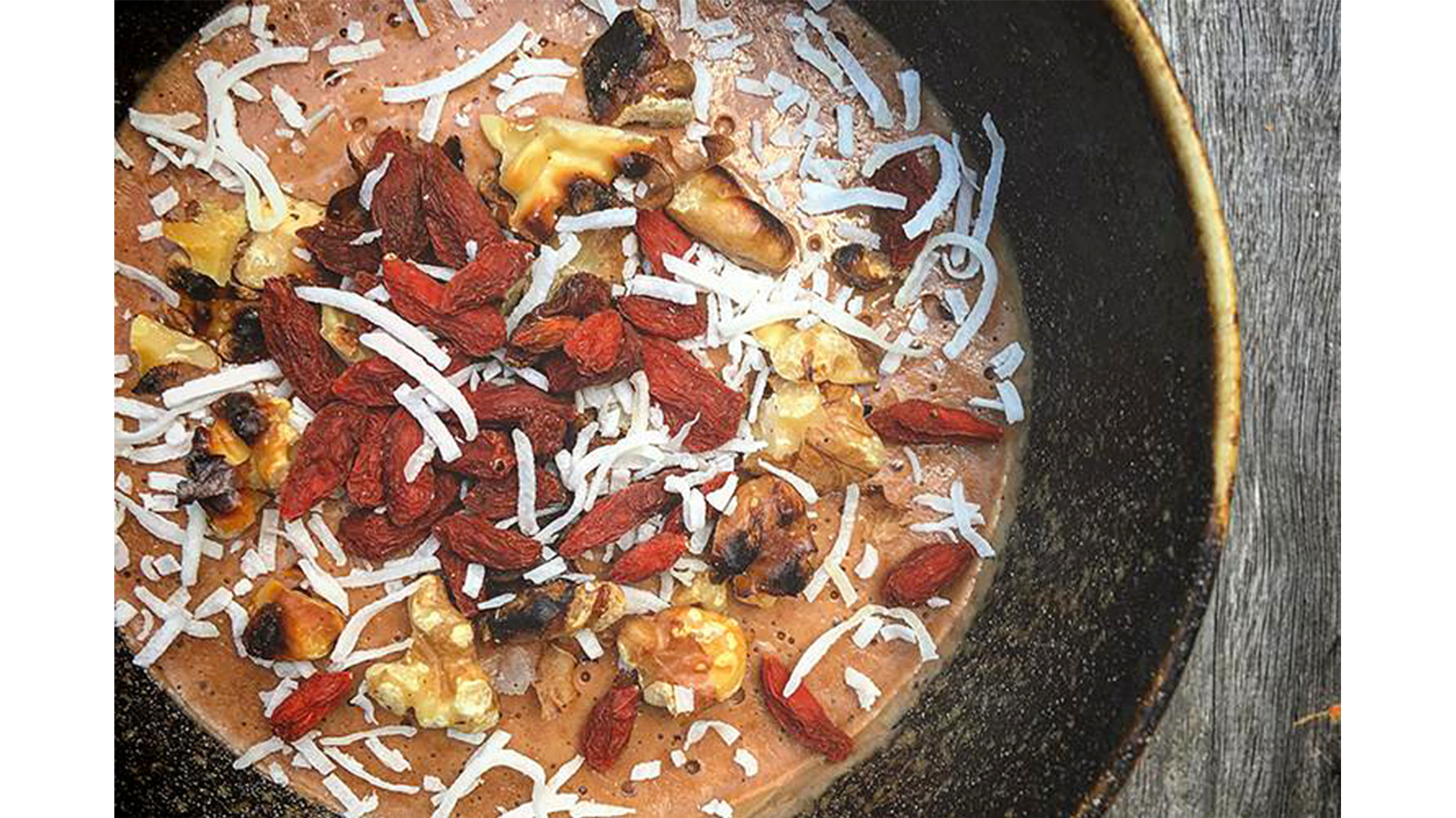 Luke’s chocolate protein mousse with coconut and goji berries.