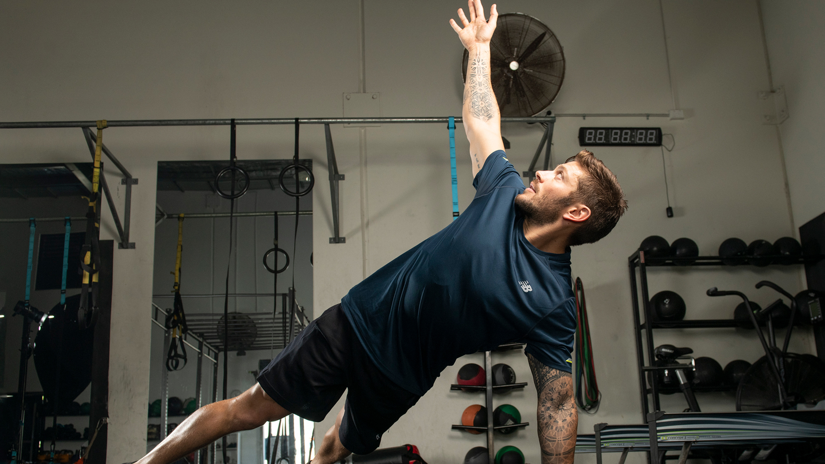 Luke Zocchi stretches his muscles during a light workout.
